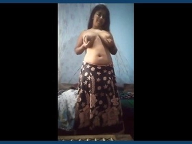 Huge-titted Indian nubile displays her