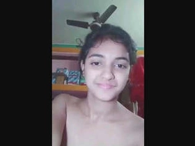 Lovely lady delights herself with her