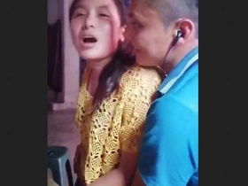 A youthful duo gets jiggish in a crowded